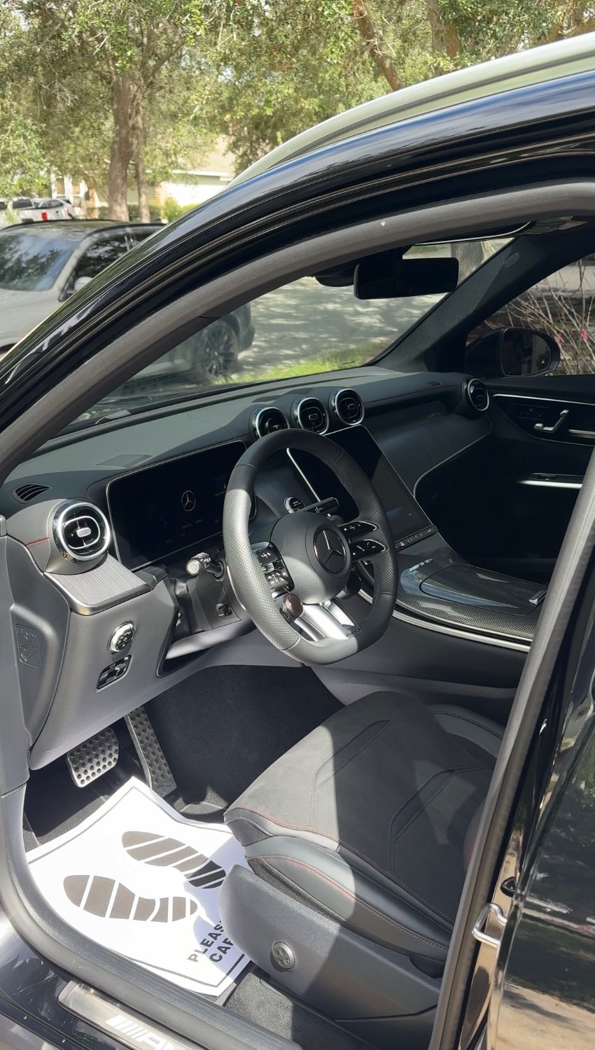 Clean Mercedes-AMG interior after an interior detail: spotless seats, dash and steering wheel